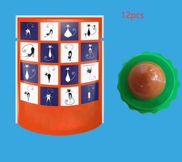 Green and blue pet cat sugar energy ball with catnip and gold fish gelatin on a floor