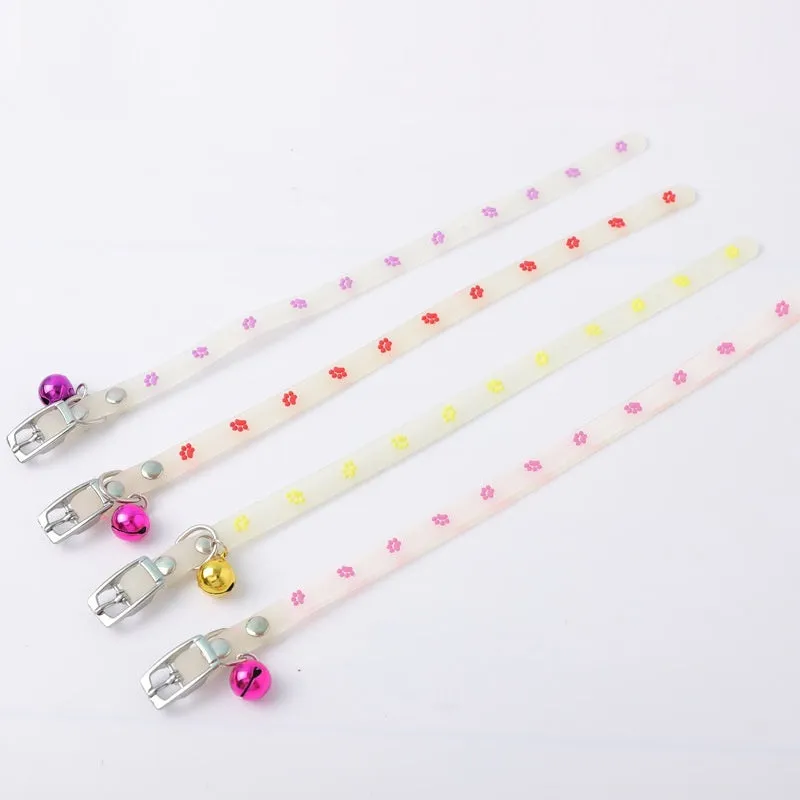 Luminous cat collar with adjustable silicone strap and metal bell in one of four patterns