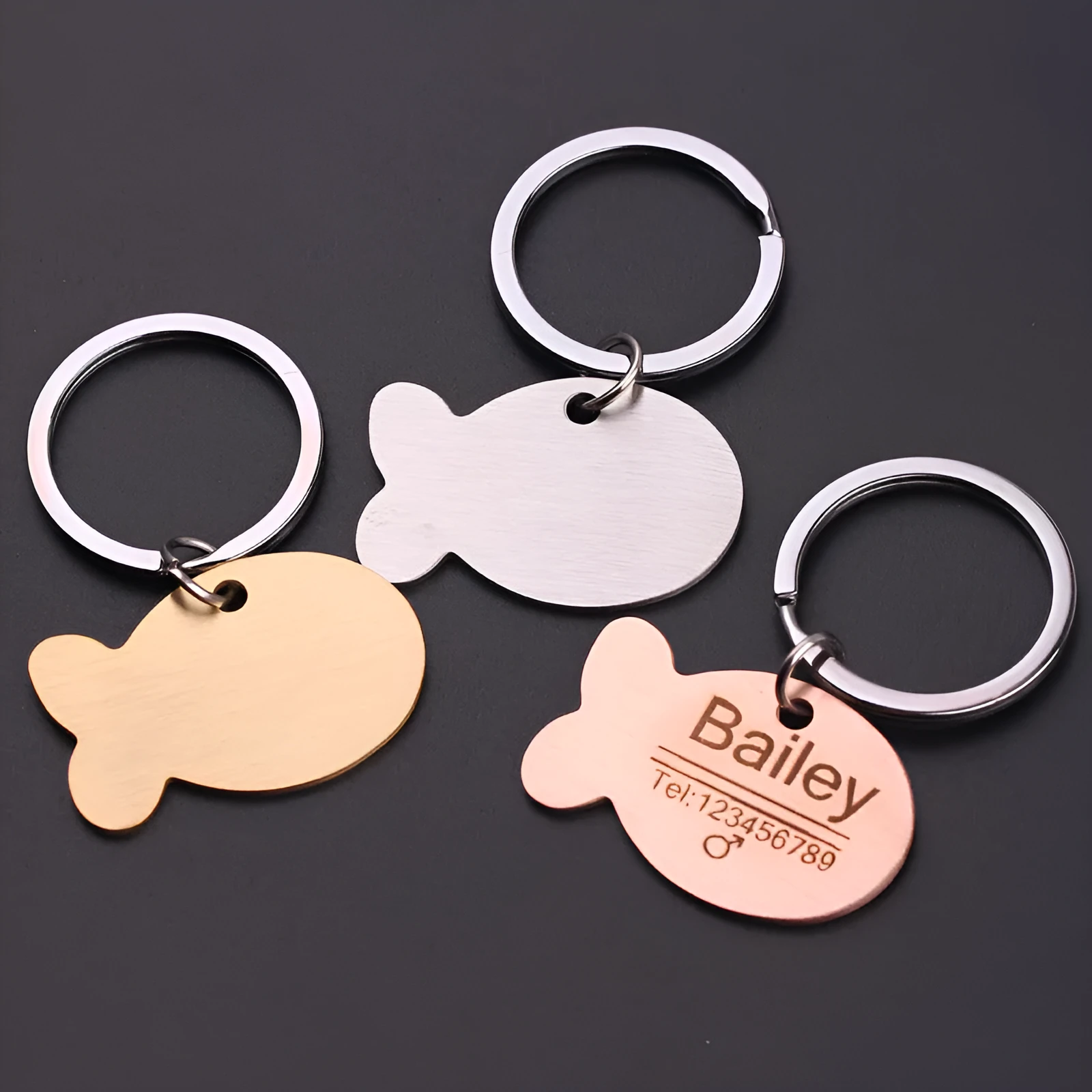 Personalised engraved stainless steel bone-shaped pet ID tag keychain in gold finish for cat or dog collar