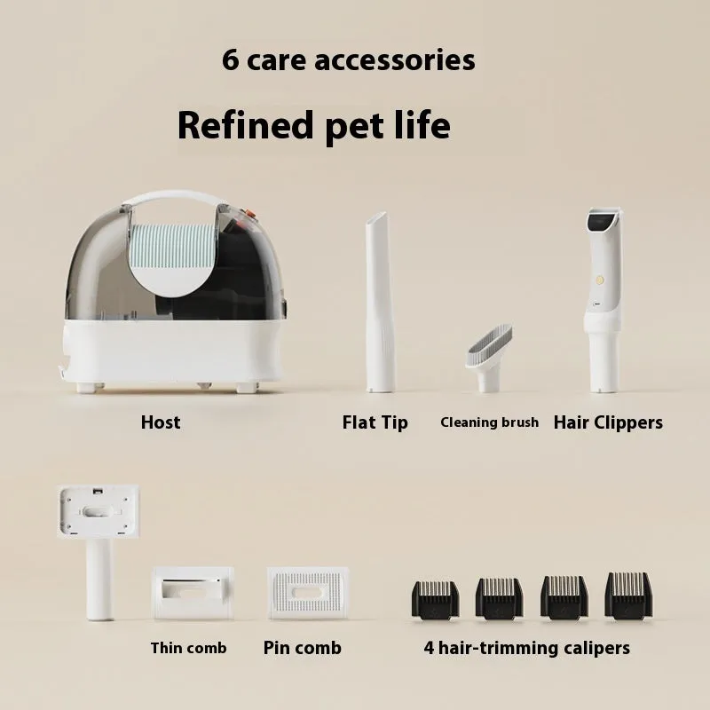 Pink and white pet grooming vacuum cleaner with electric shaver attachment and 1.4 metre hose