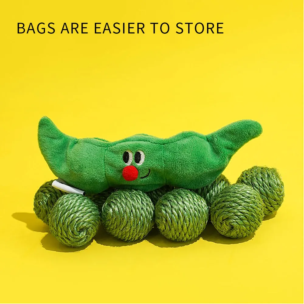 Three green sisal rope cat toy balls with rustling soundstone next to pea pod storage bag