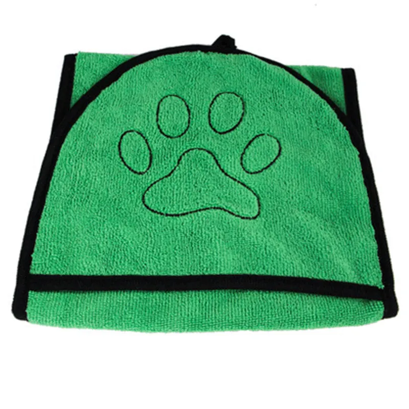 Pet absorbent dog bath towel in blue, green, and grey plain design drying a dog after bath