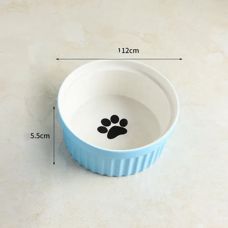 Raised ceramic cat food bowl with white fish bone pattern – protects pet cervical spine during feeding