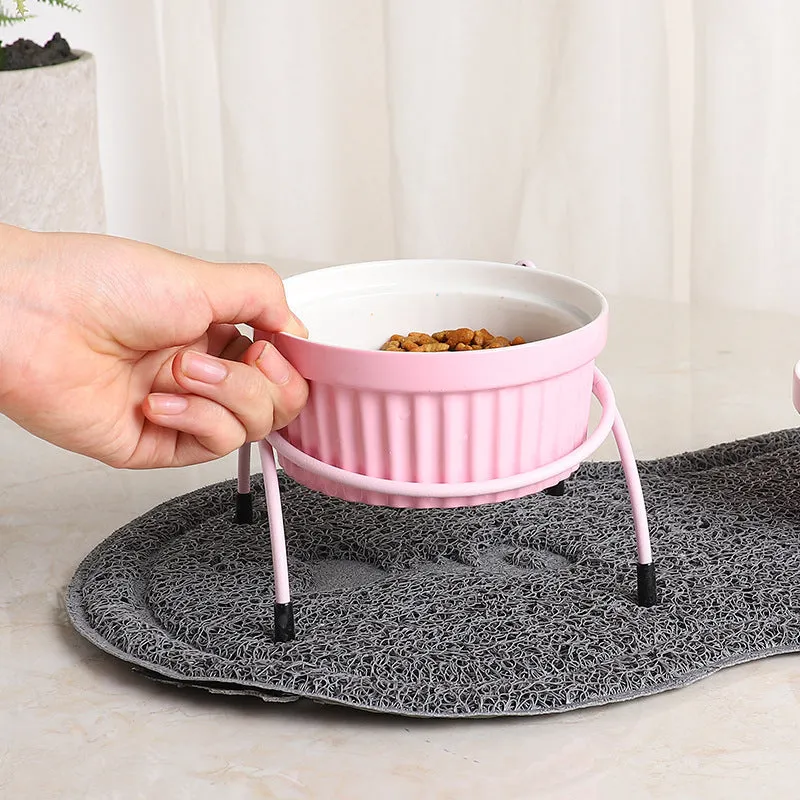 Raised ceramic cat food bowl with white fish bone pattern – protects pet cervical spine during feeding