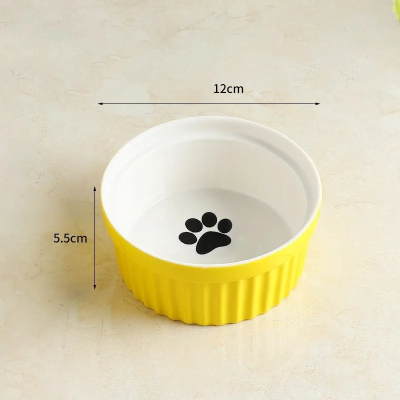 Raised ceramic cat food bowl with white fish bone pattern – protects pet cervical spine during feeding