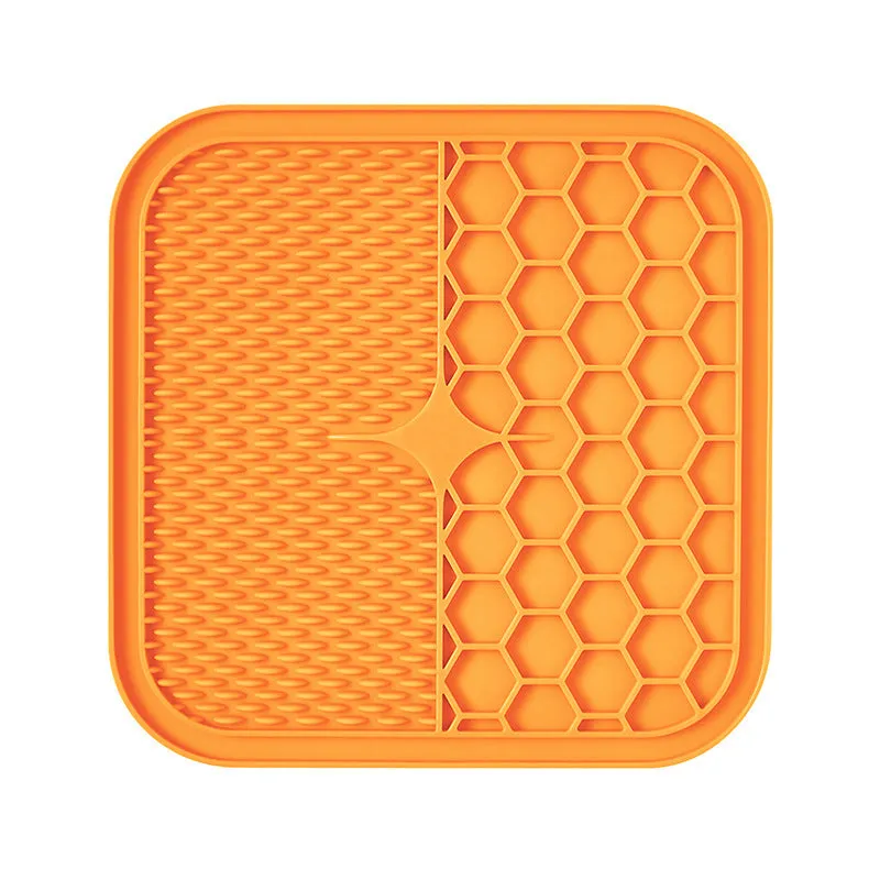 Silicone pet slow feeder licking pad in blue and orange with textured surface and scraper