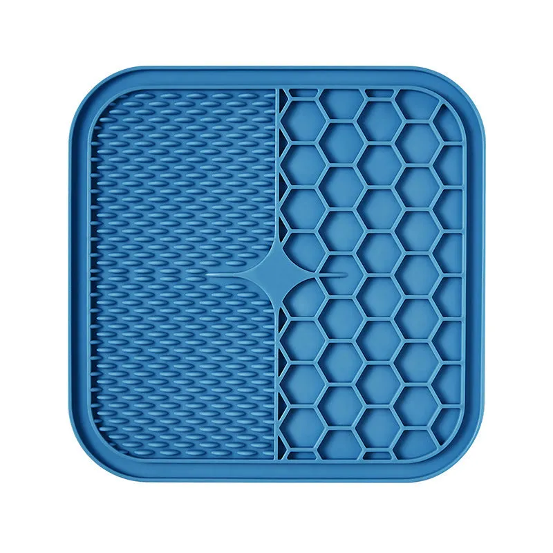 Silicone pet slow feeder licking pad in blue and orange with textured surface and scraper