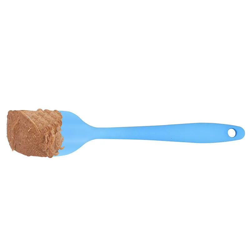 Silicone pet slow feeder licking pad in blue and orange with textured surface and scraper