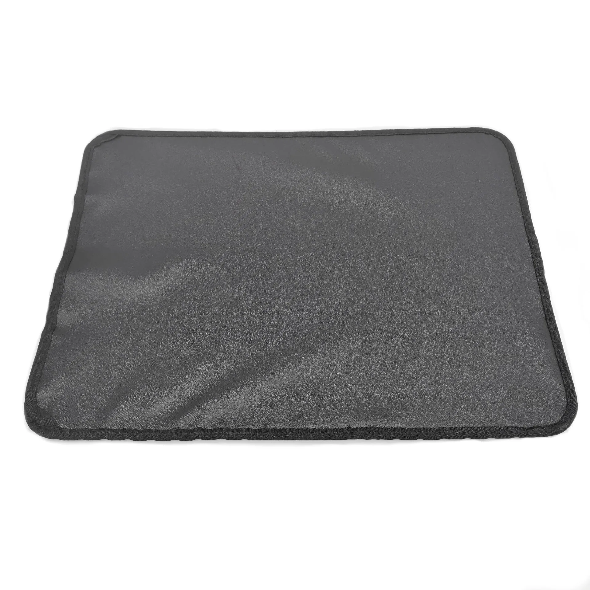 Double-layer EVA cat litter mat in black with honeycomb texture, 1.5cm thick, placed under a litter tray