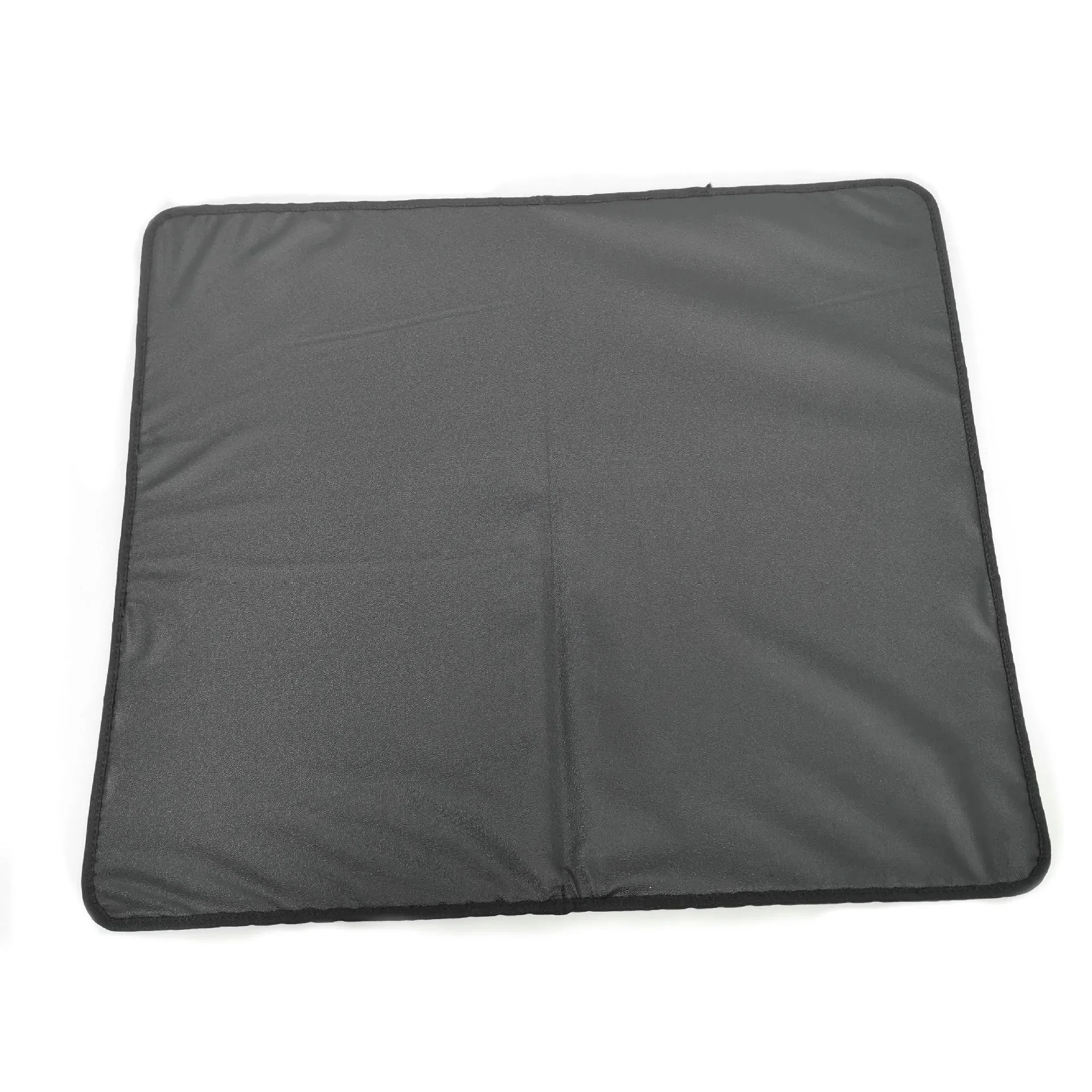 Double-layer EVA cat litter mat in black with honeycomb texture, 1.5cm thick, placed under a litter tray