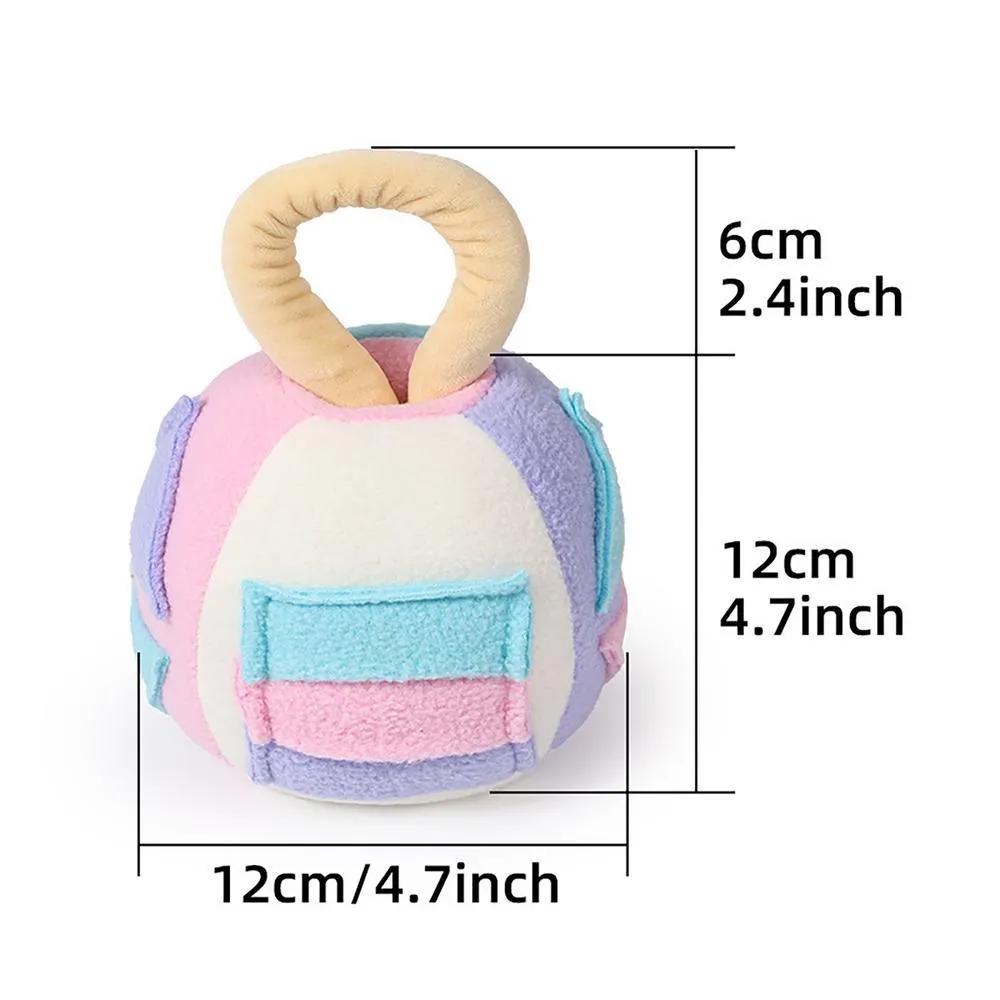 Green and pink plush squeaky ball dog toy with treat pockets on a white background