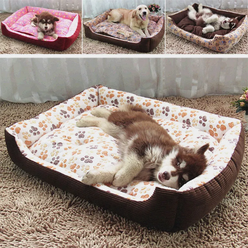Beige sofa-style dog bed with plush fabric and raised bolsters for small dogs