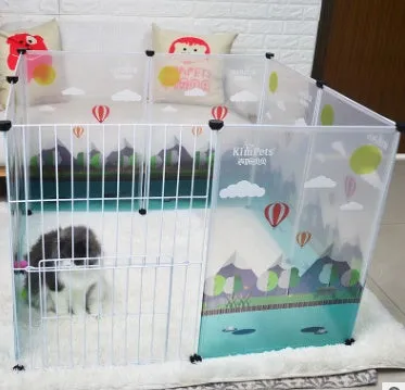 Pet transparent fence with six clear plastic panels arranged as a barrier on a wooden floor, showing interlocking connectors