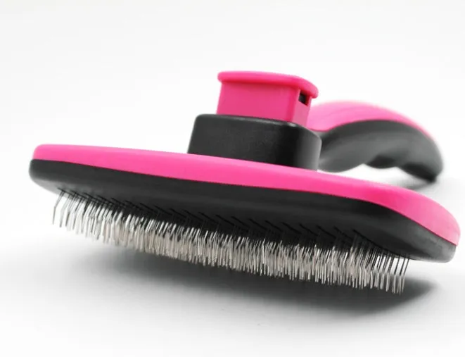 Rose red self-cleaning pet comb with stainless steel teeth and ergonomic handle for removing dog and cat hair