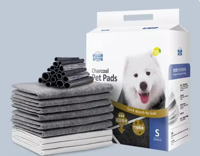 Pack of thickened disposable dog urine training pads showing adhesive backing and size options.