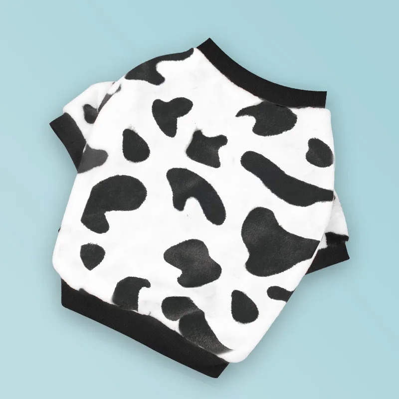 Coral fleece dog pyjamas in Bear style pattern on a female dog, side view, winter apparel