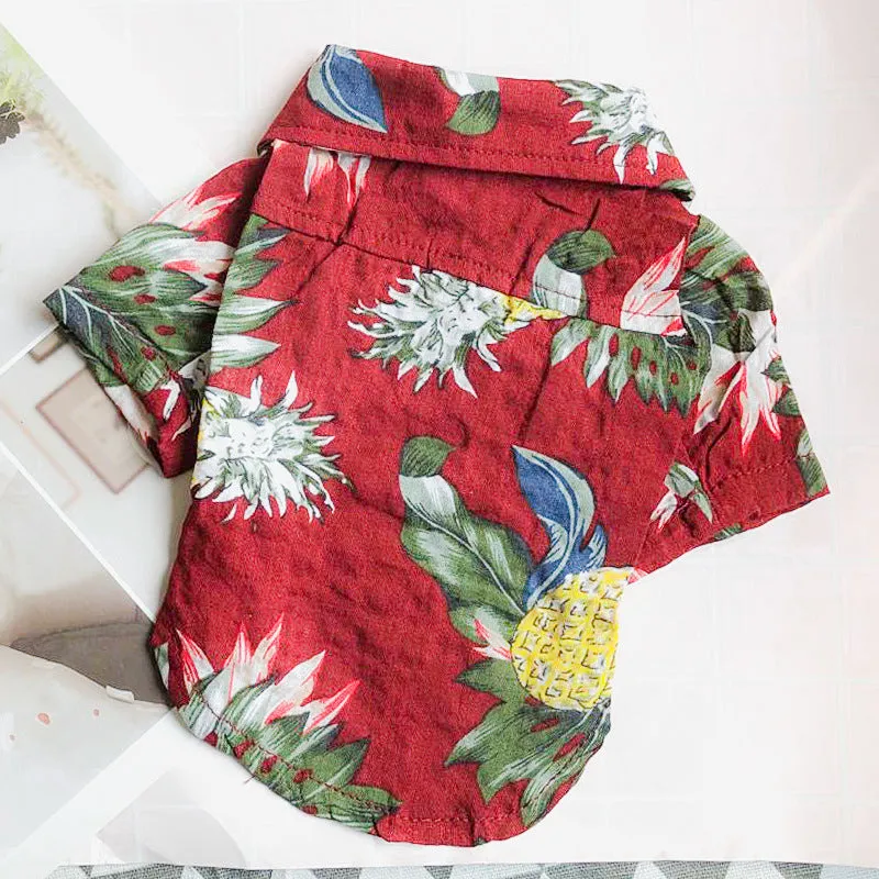 Hawaiian pattern small dog shirt in blue with button closure and loose short sleeves