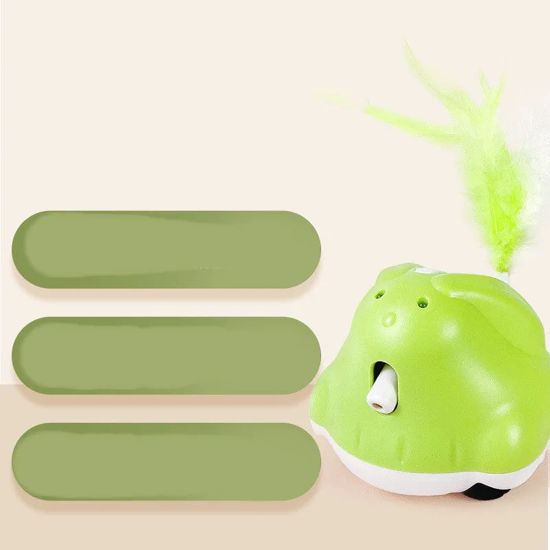 Green USB rechargeable electric cat teaser with rabbit design, infrared laser, and feather attachments on a floor