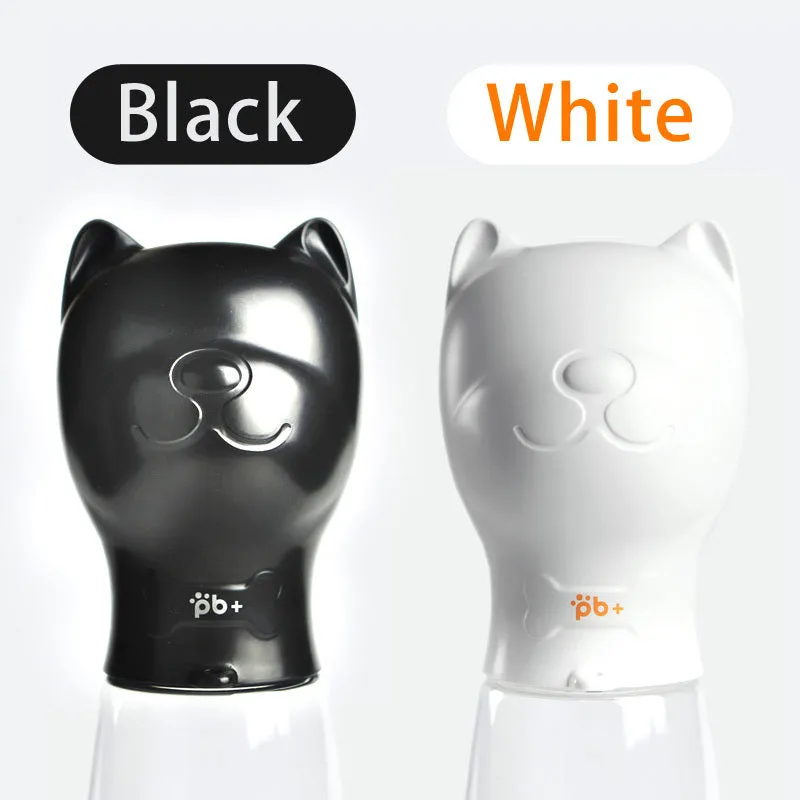 Portable pet dog drinker water bottle in black with automatic leak proof outdoor feeder for dogs and cats