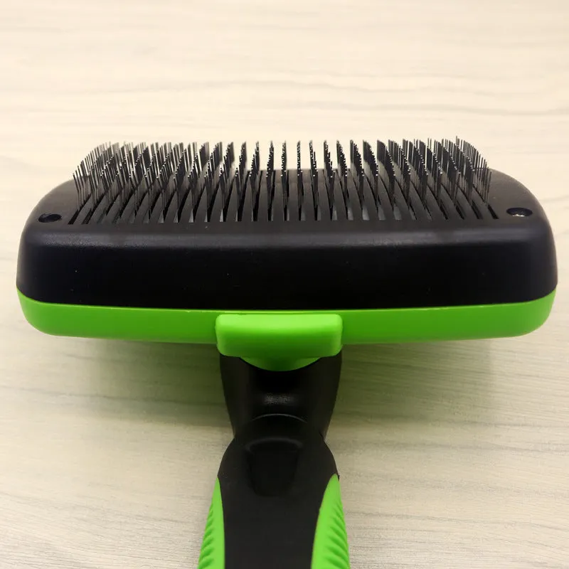 Cat and dog grooming needle comb with stainless steel teeth and dark green ABS TPR handle on white background