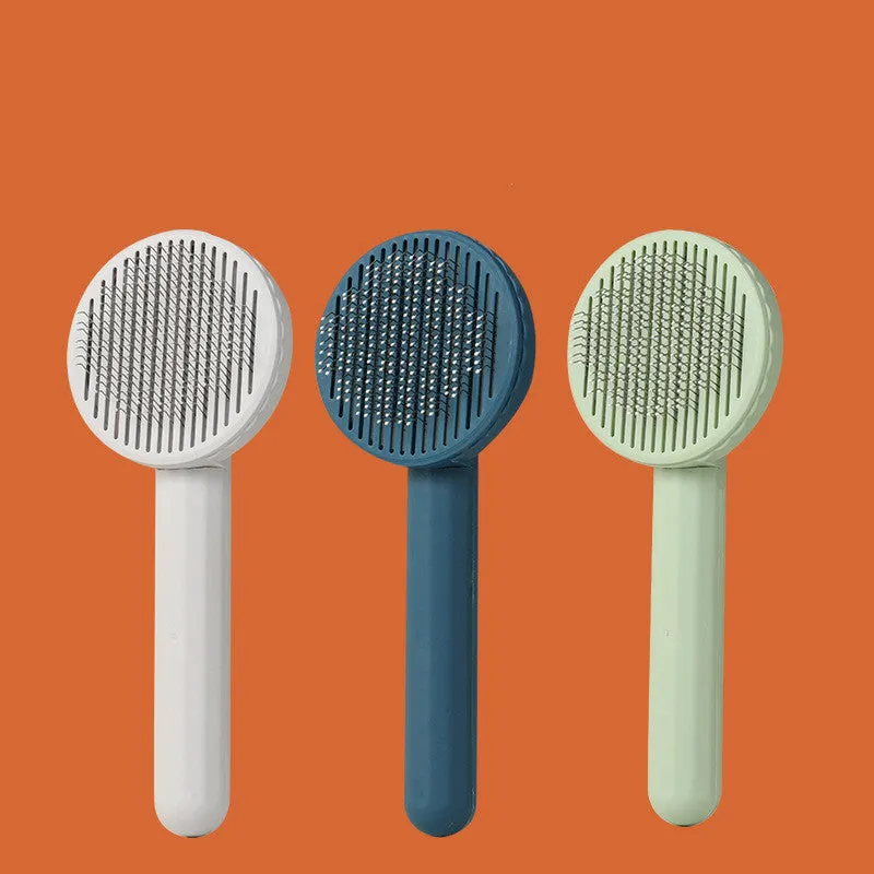 Button self-cleaning pet comb with stainless steel needles and ABS handle in blue colour