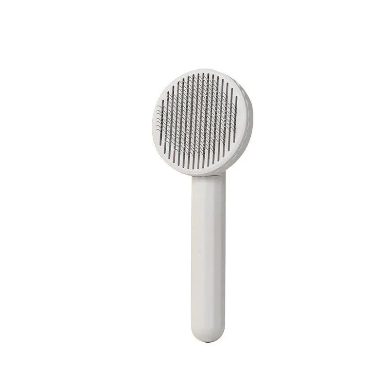 Button self-cleaning pet comb with stainless steel needles and ABS handle in blue colour