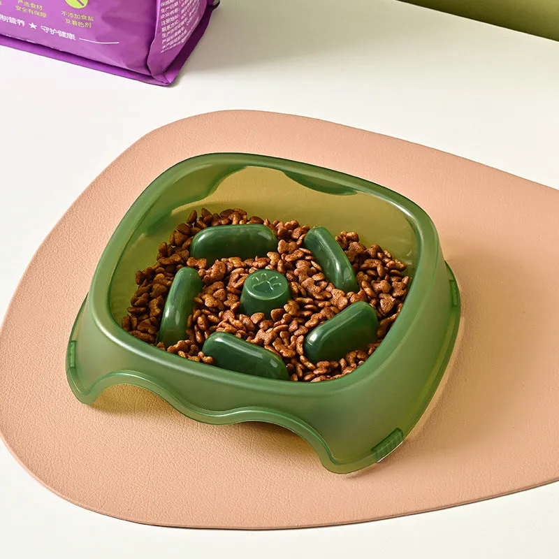 Blue plastic dog slow feeder bowl with internal maze pattern for portion control.