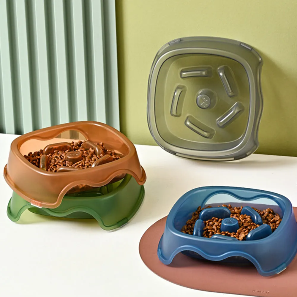 Blue plastic dog slow feeder bowl with internal maze pattern for portion control.