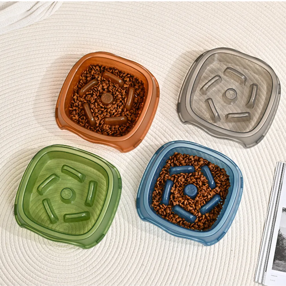 Blue plastic dog slow feeder bowl with internal maze pattern for portion control.