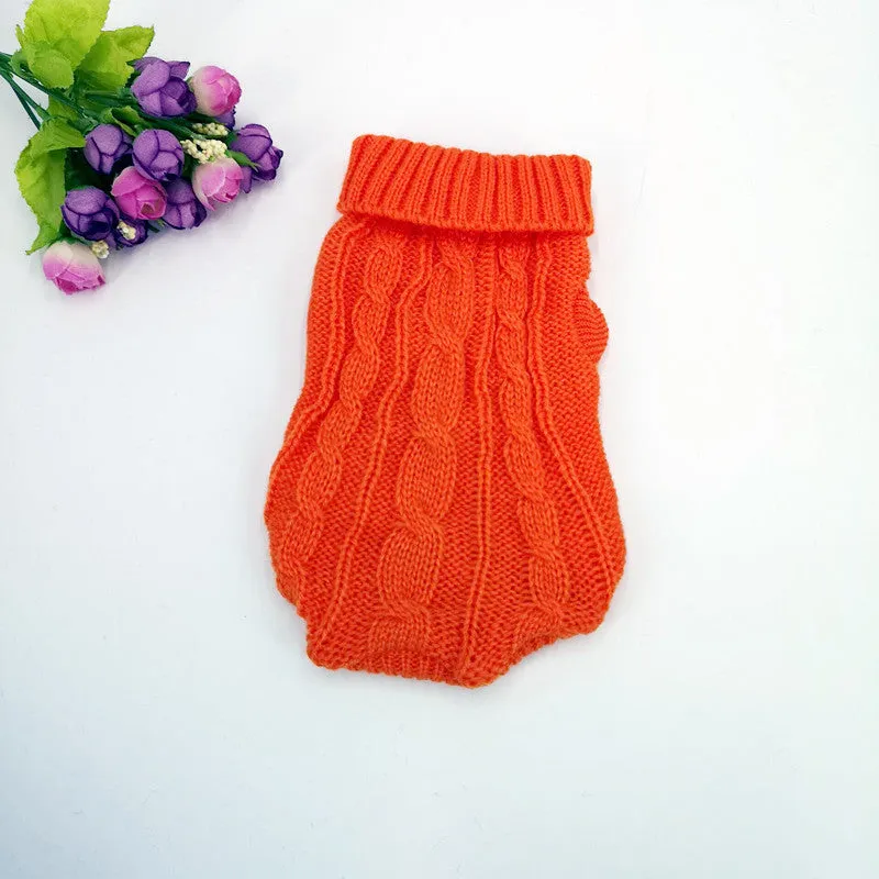 Wool dog sweater for small pets in red, front view on a dog, with knit texture
