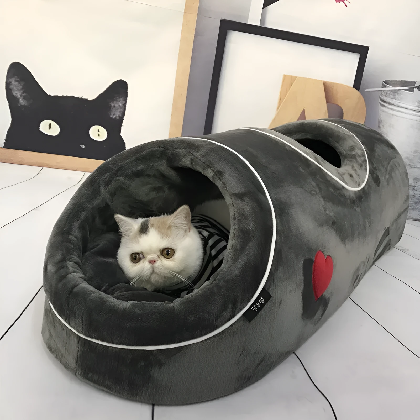 Double-hole flannel cat nest in grey with love heart pattern, 80x30x26cm, side view showing two openings