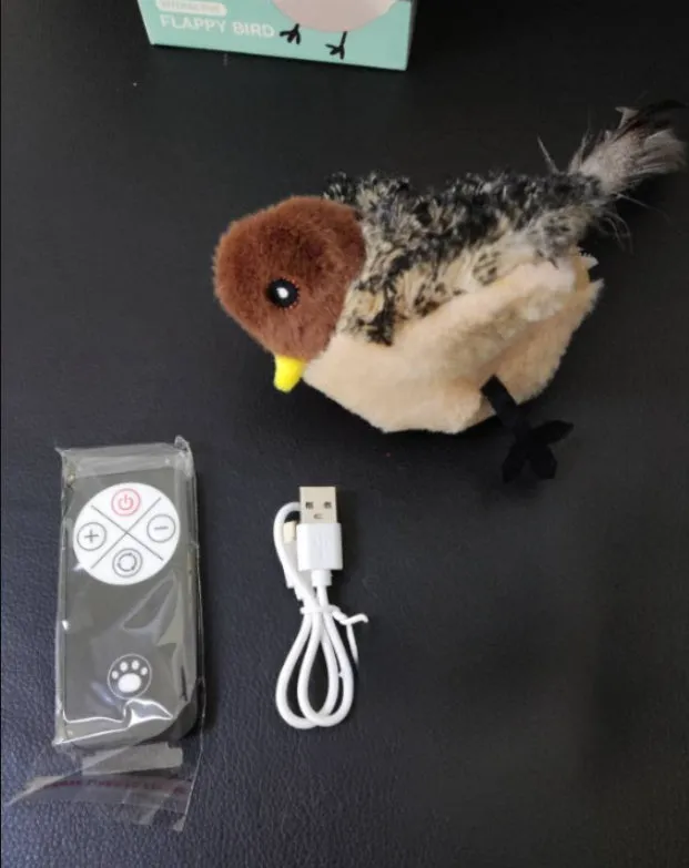 Interactive sounding plush cat toy with simulation bird and mouse electric molar design
