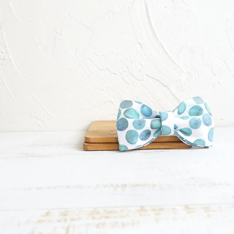 Polyester pet bow collar jewellery in bubble colour on a light background showing size options XS to XL