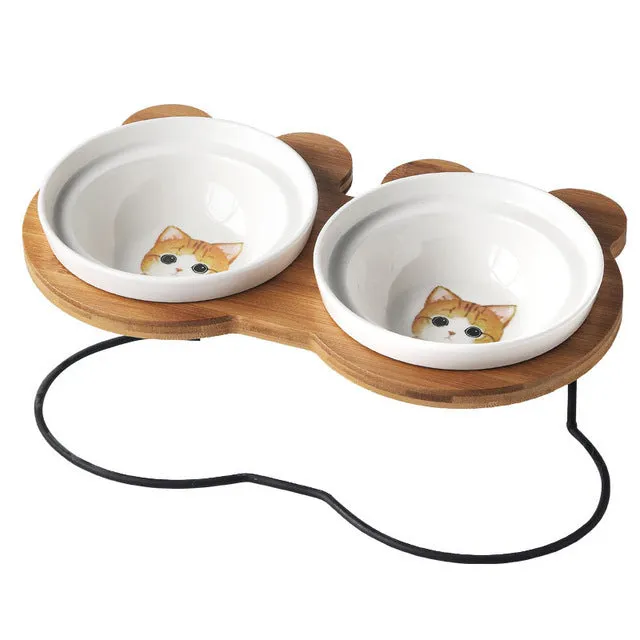 Ceramic cat bowl holder with rack and cat face design, elevated to protect spine