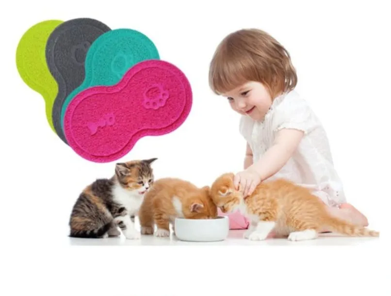 Rose red plastic cat litter pad 45.5x25.5cm placed under a litter tray