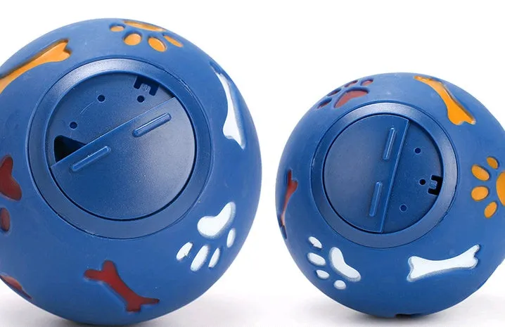 Rubber puzzle ball for dogs with uneven surface, footprints pattern, blue and red colours, sizes 7.5cm and 11cm