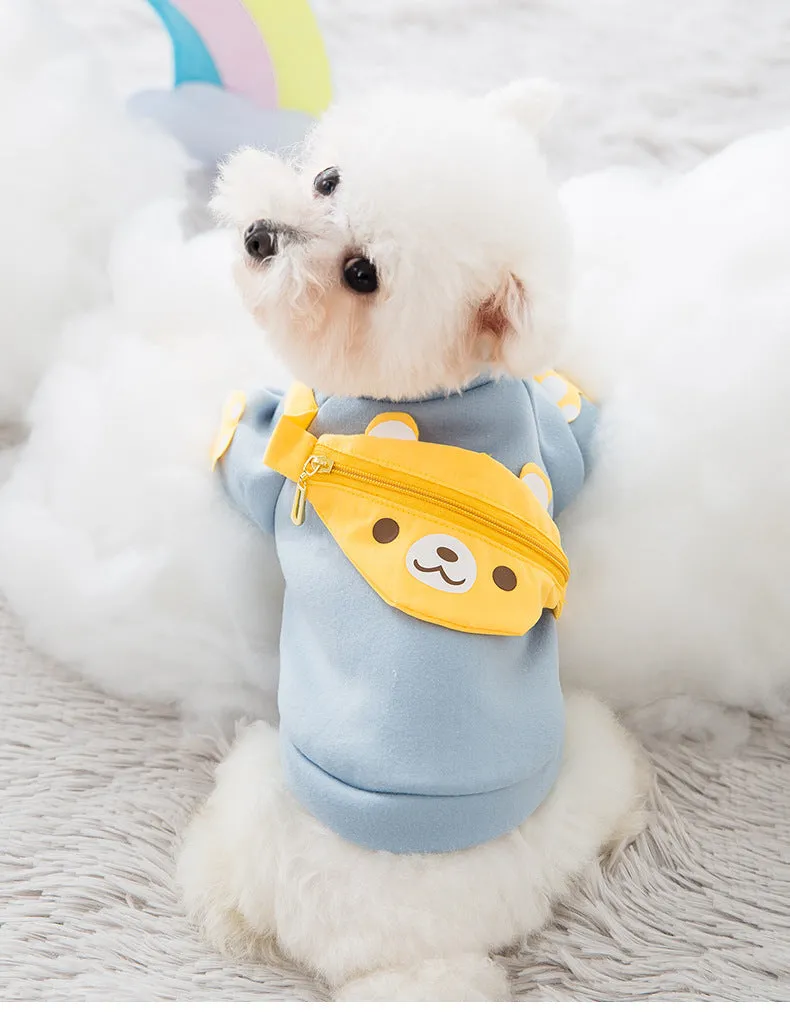 Blue cartoon backpack pet clothes milk silk sweater on small dog in side view