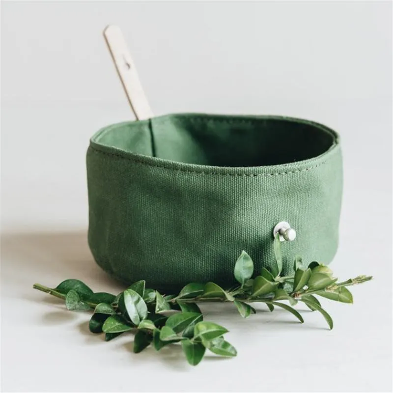 Waterproof foldable travel dog bowl in oil wax canvas round shape 150x75mm green and grey colour options