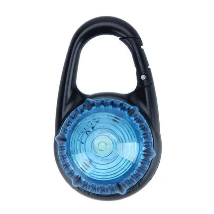 Pink LED flashing pet safety pendant clipped onto a collar with CR2032 batteries, showing 57x33mm ABS water-resistant build