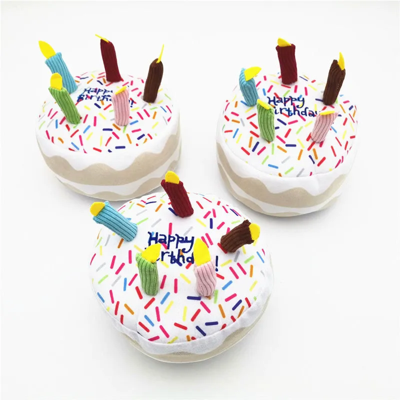 Four-piece dog birthday cake plush toy set including big cake, small cake, gift box, and bone on white background