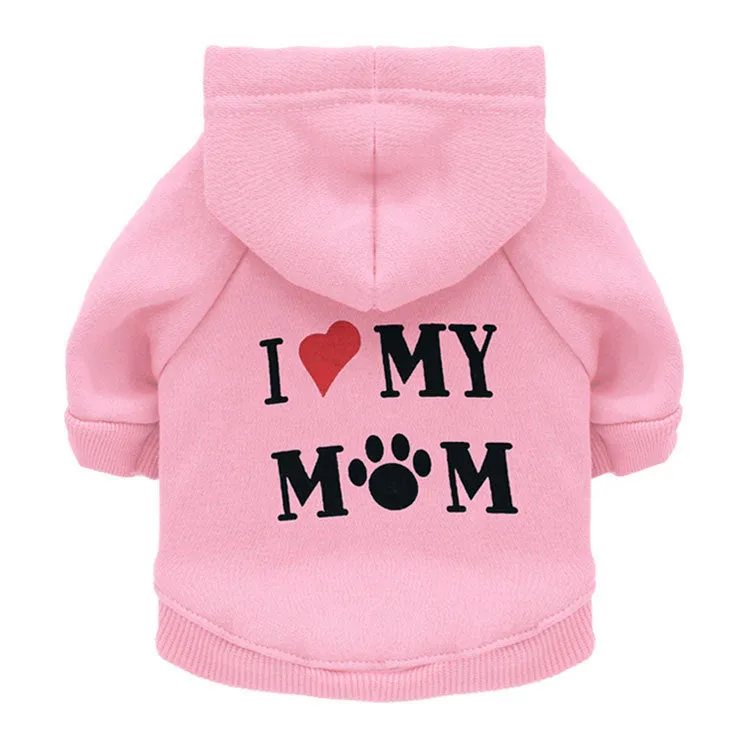 Fleece printed dog clothes in style A on a small dog, with collar opening and four leg holes