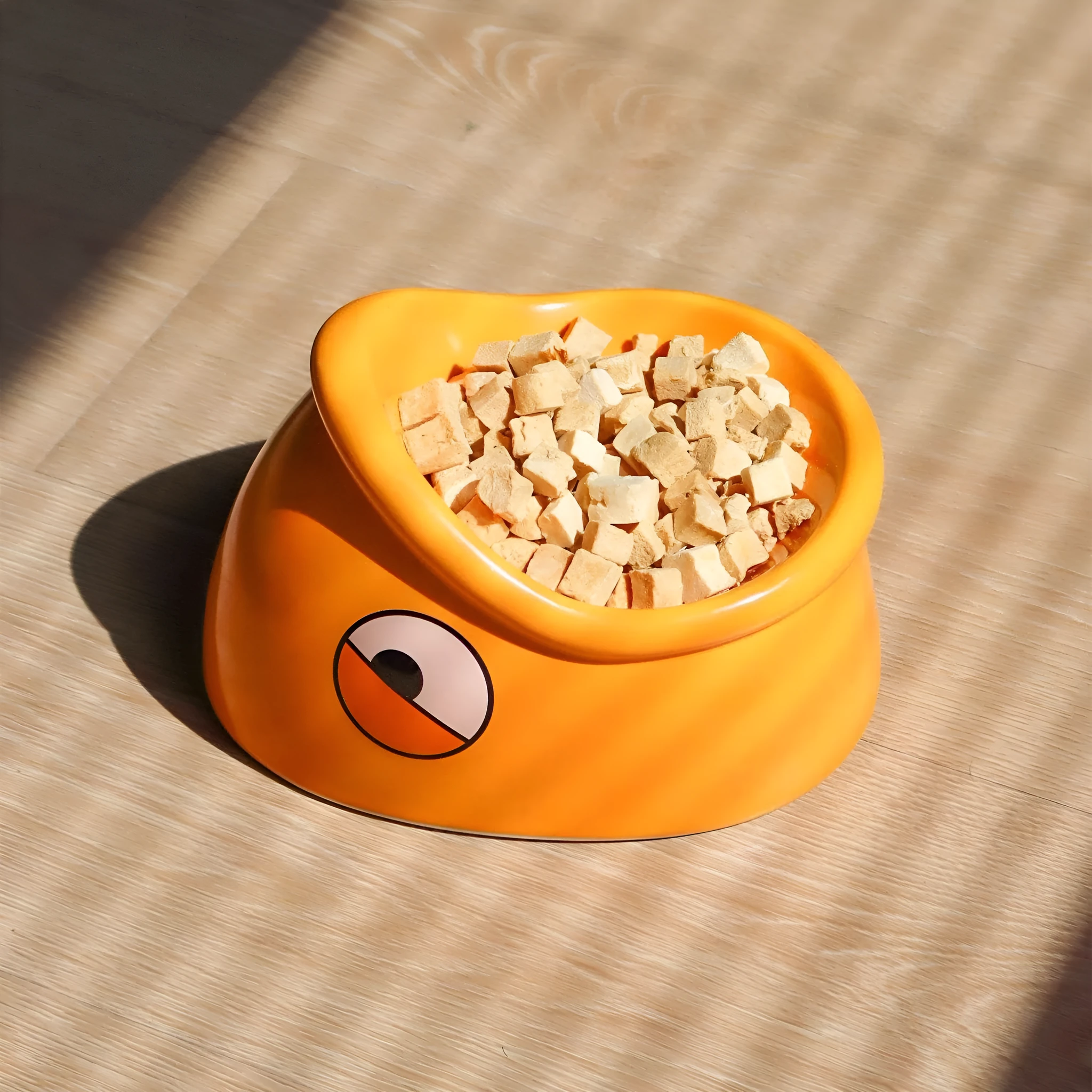 Orange ceramic overturning-proof cat bowl with fish head design, 196x121x149mm