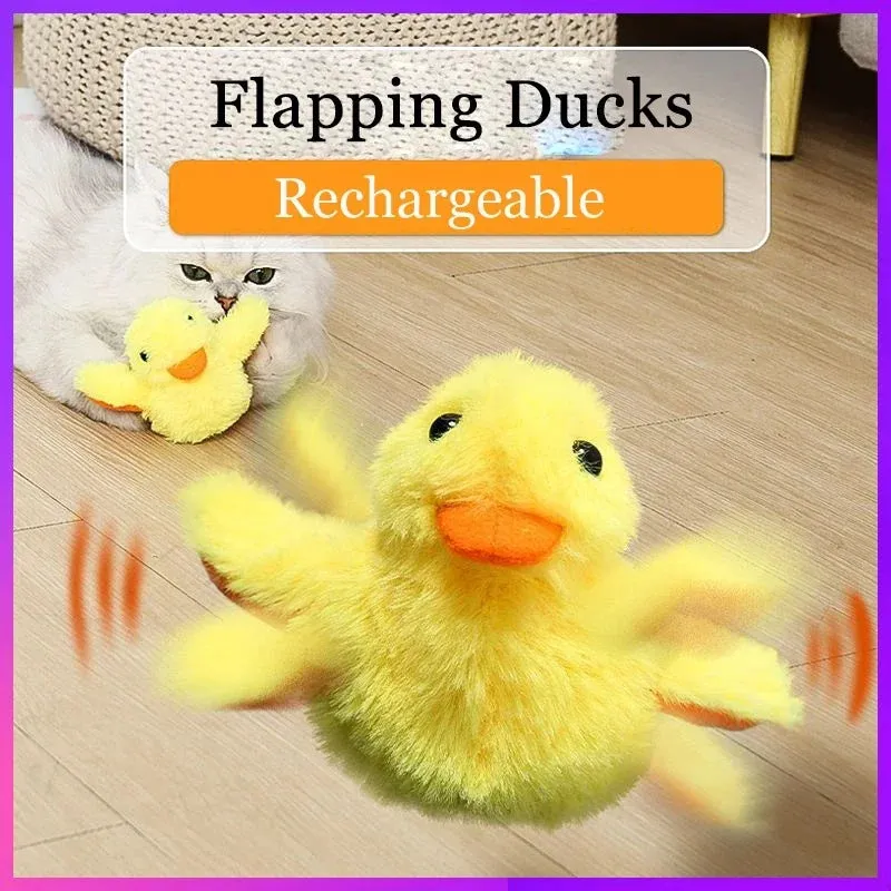 Yellow flapping duck electronic cat toy with removable plush cover on a plain background