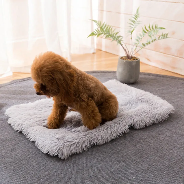 Plush pet nest with non-slip base, water-resistant material, available in multiple sizes and colours