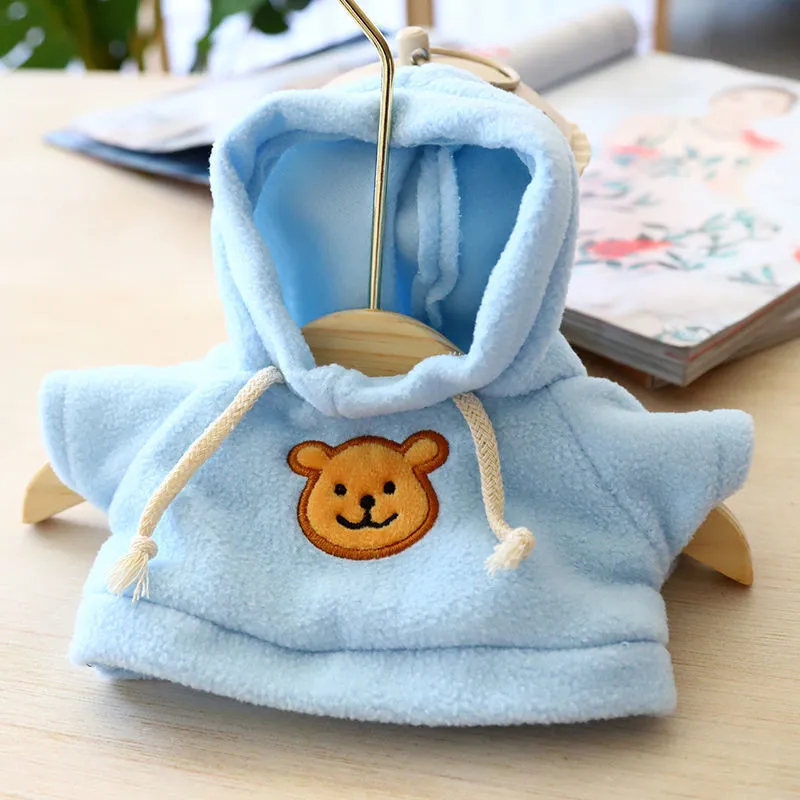 Blue dog hoodie sweater on a small dog, showing the hood and front opening.