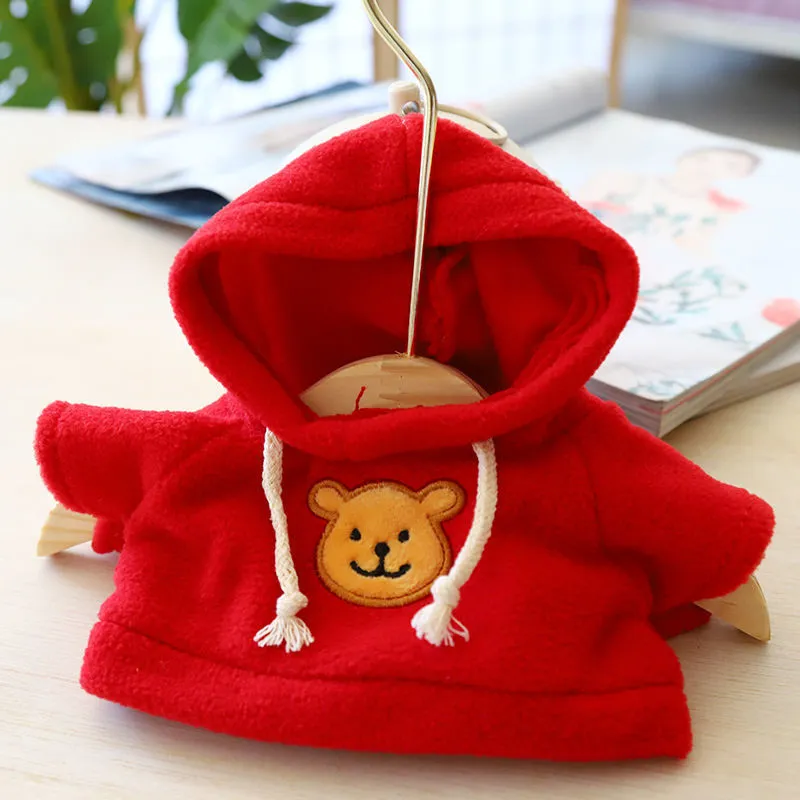 Blue dog hoodie sweater on a small dog, showing the hood and front opening.
