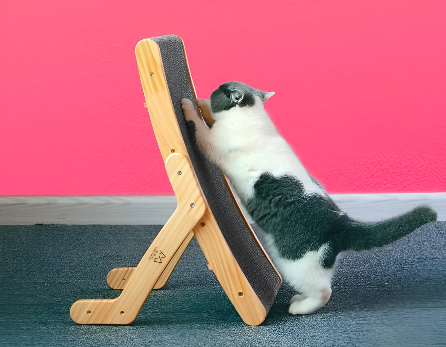 Corrugated cat scratch board with solid wood frame, 55cm by 32.5cm by 13cm, on a wooden floor