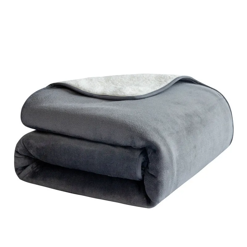 Lambswool waterproof pet blanket duvet in gray 75x100cm on a sofa