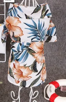 Hawaiian dog style shirt in cotton with multicolor print on a white background, sizes XS to XXL