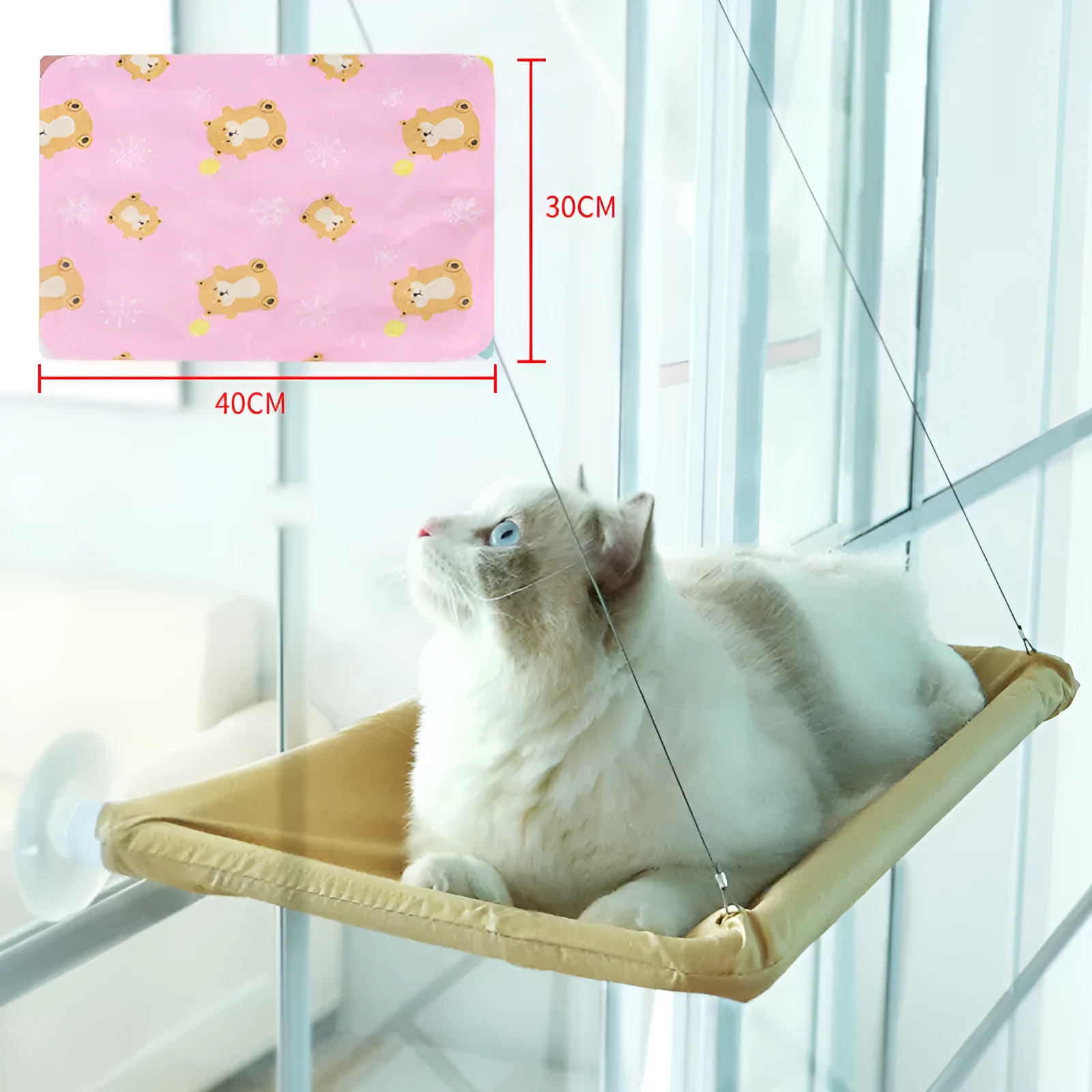 Blue cat hammock with suction cups attached to a window, featuring breathable fabric and metal frame